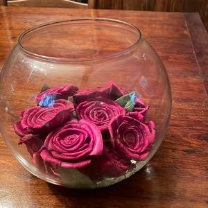 Handcrafted glass bowl with 17 silk or paper roses set in resin.